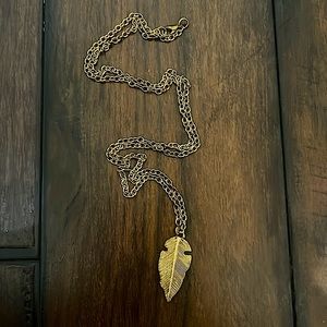 Gold feather necklace